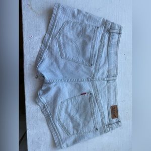 Levi’s shorty shorts, white and bight blue stripes, size 11.